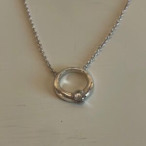 Short necklace with a circular and CZ pendant